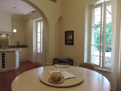 a kitchen with a table with a bowl on it at La Suite Gregoire in Apt
