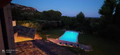 an overhead view of a swimming pool on top of a house at le mas du luberon rouge in Cheval-Blanc