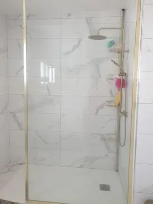 a shower with a glass door in a bathroom at Villa in Carpentras