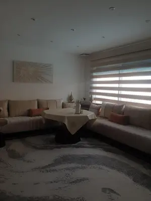 a living room with a couch and a table at Villa in Carpentras