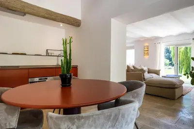a dining room with a table and chairs at Gîte Terrasse in Gordes