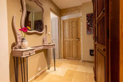 a bathroom with a sink and a mirror on the wall at La Bastide des Amouriers in Caumont-sur-Durance