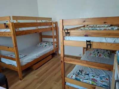 a room with three bunk beds in a room at Maison familiale Luberon in Lauris