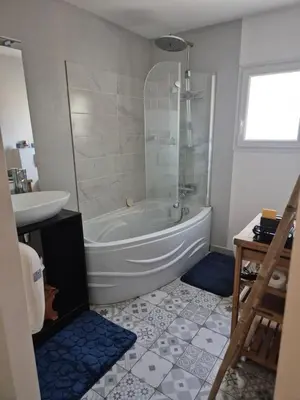 a bathroom with a shower and a tub and a sink at Chambre meublé Eden à Noves in Noves