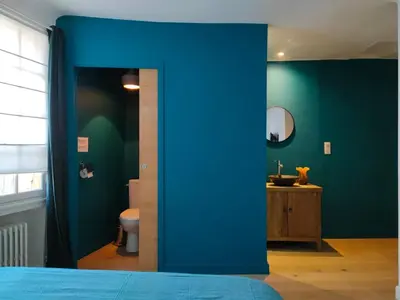 a blue bedroom with a toilet and a sink at Charming house in Provence, 2 to 10 people in Saignon