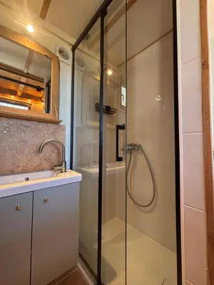 a bathroom with a shower and a sink at La Tiny du Luberon in Pertuis