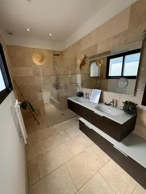 a bathroom with a sink and a shower at Villa Cali-Provence in Le Puy-Sainte-Réparade