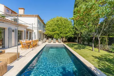 a swimming pool in the backyard of a house at L'Echappée aixoise in Aix-en-Provence