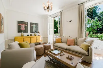 a living room with a couch and a table at Château Saint Perret in Avignon
