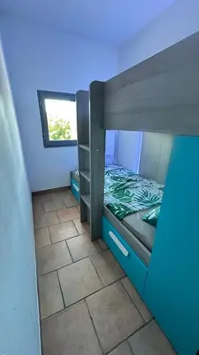 a small room with a bunk bed and a window at Art Appartement Kristina 80m2 in Graminier