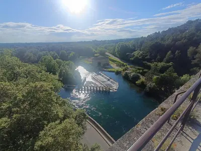 an aerial view of a river with a pier at Villa Bulle de raisin in LʼIsle-sur-la-Sorgue