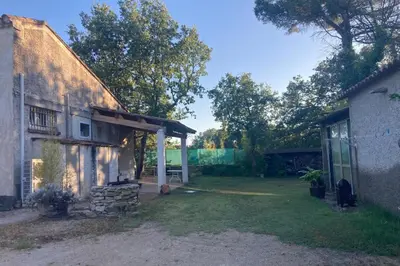 an old house with a porch and a yard at Villa Caromb - Mont Ventoux Garden - by TGB in Caromb