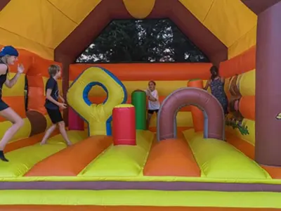 a childs play room with an inflatable bounce house at Chalet 46m² avec Terrasse à Noves - API-1-52-531 in Noves