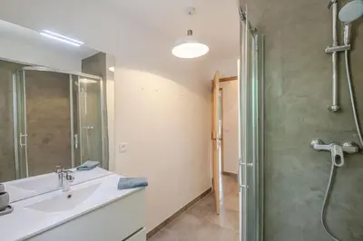 a bathroom with a sink and a shower at La Mathilde - Premium Pool Villa Private Tree-Top Adventure in Bonnieux