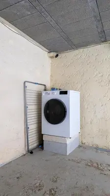 a microwave sitting in the corner of a room at Duplex en centre ville avec un Garage privé in Salon-de-Provence