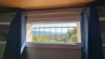 a window in a room with a view at Gîte Le Verger Paisible in Malemort-du-Comtat