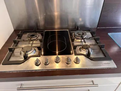 a stove top oven with a stove topilitterness at La casa du Roy René in Aix-en-Provence