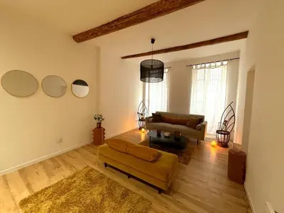 a living room with two couches and a couch at CARPENTRAS 2ème étage BEL APPARTEMENT au CENTRE VILLE in Carpentras