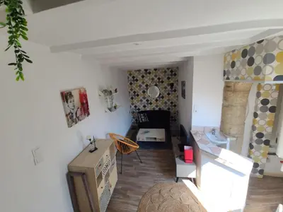 a living room with a tv and a couch at Village House in Pélissanne near Luberon in Pélissanne