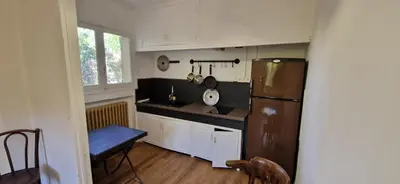 a small bathroom with a toilet and a window at Family house in town centre 8 guest AC FreeParking in Aix-en-Provence