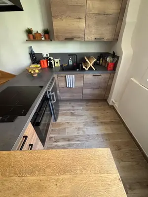 a kitchen with wooden counters and a counter top at Studio charmant centre historique au calme in Aix-en-Provence
