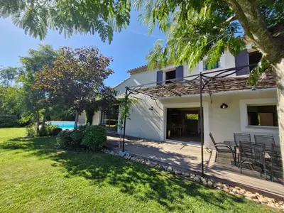 an exterior view of a house with a yard at La Canopée en Provence - Piscine, Vue sur le Mont Ventoux ! in Carpentras