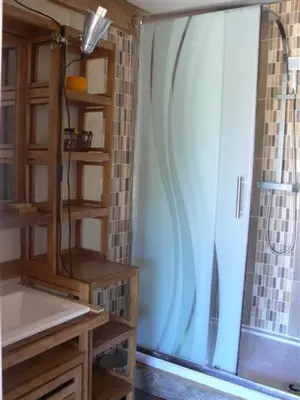 a bathroom with a shower and a sink at Villa provençale piscine, calme et confort in Saint-Cannat