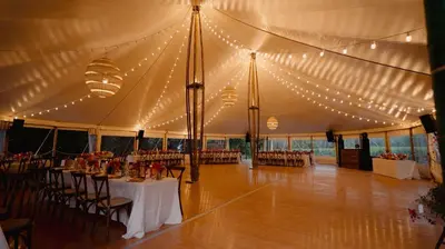 a tent with tables and chairs and lights at Maison du Berger - Vignoble Château Barbebelle, Rognes, maison provençale avec jardin partagé et parking - proche d'Aix-en-Provence - 5 personnes in Rognes
