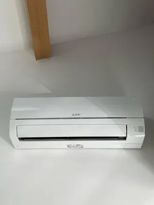 a dvd player sitting on top of a white table at Tiny house avec terrasse privée - Parking - Fibre TV in Lambesc