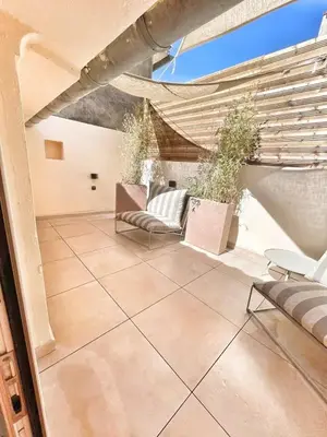 a small kitchen with a sink and a counter at Le Mignet by Rentalaix in Aix-en-Provence
