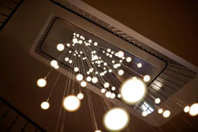 a bunch of lights hanging from a ceiling at Domaine de Fontenille - Fontenille Collection in Lauris