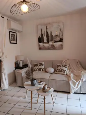 a collage of four pictures of a bed at Le Roly's in Saint-Saturnin-lès-Avignon