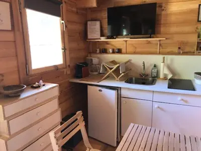 a kitchen with a sink and a counter with a sink at chalet le domaine des cigales in Cavaillon