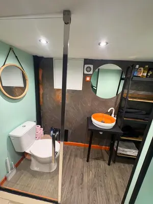 a small bathroom with a toilet and a sink at Le Cocoon Provençal - à deux pas de la mairie tout inclus in Aix-en-Provence