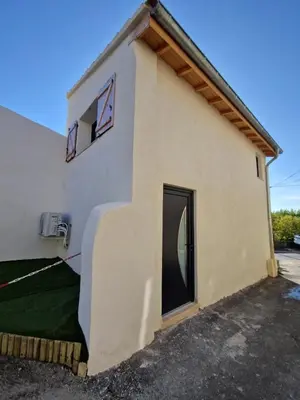 a building with a door on the side of it at Duplex Design - Clim - Parking privé - Wifi - by CommeChezSoi in Vedène