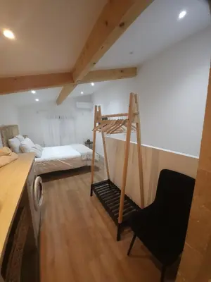 a dorm room with a bunk bed and a ladder at Duplex Design - Clim - Parking privé - Wifi - by CommeChezSoi in Vedène