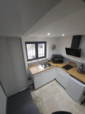 an overhead view of a kitchen with a sink at Duplex Design - Clim - Parking privé - Wifi - by CommeChezSoi in Vedène