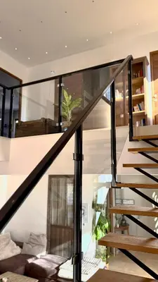 a glass staircase in a house at Modern Villa With Views Of Gordes in Gordes