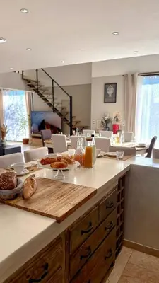 a kitchen with a counter with food on it at Modern Villa With Views Of Gordes in Gordes
