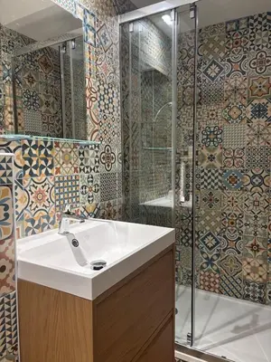 a bathroom with a sink and a shower at Chez Fleur in Aix-en-Provence