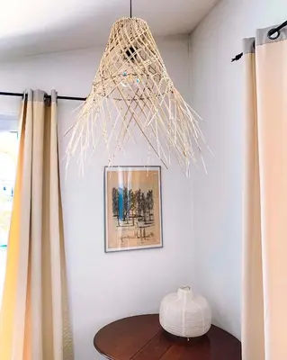 a chandelier hanging over a table in a room at Maison Pertuis Provence in Pertuis