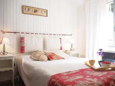 a bedroom with a bed with a tray on it at Holiday Home in Provence near Mont Ventoux in Bédoin