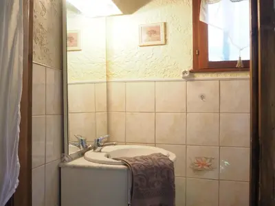 a bathroom with a sink and a mirror at Holiday Home in Provence near Mont Ventoux in Bédoin
