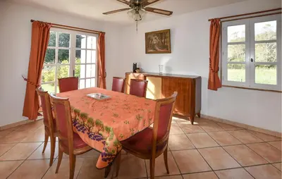 a dining room with a table and chairs at Pet Friendly Home In Gargas With Wifi in Gargas