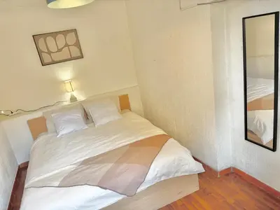 a bathroom with a tub and a sink and a toilet at Cozy apartment Aix-en-Provence city center in Aix-en-Provence