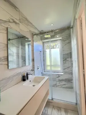 a bathroom with a sink and a shower at Studio centre Aix - Climatisé avec terrasse in Aix-en-Provence