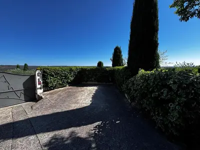 a skateboard ramp parked next to a hedge with a tree at Maison V in Ventabren