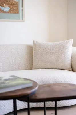 a living room with a couch and a table at Grand Cèdre in Aix-en-Provence