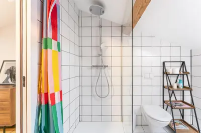 a bathroom with a shower and a toilet at Design & Cozy, 10 meters from Cours Mirabeau, AC in Aix-en-Provence