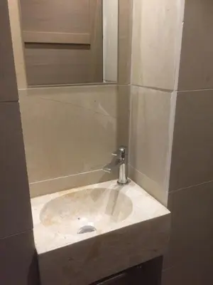 a bathroom with a sink and a mirror at AJOUCADOU premiere loge in Lourmarin